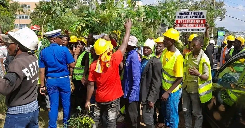 Construction workers protesting at the Milimani Law Courts.